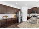Bright kitchen with stainless steel appliances, granite countertops, and ample cabinet space at 160 Brookhaven Rd, Summerville, SC 29486