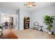Cozy office space with french doors, neutral walls, and built-in shelving for a functional workspace at 160 Brookhaven Rd, Summerville, SC 29486