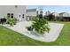 Concrete patio featuring potted plants and an outdoor dining set in a fenced backyard at 160 Brookhaven Rd, Summerville, SC 29486