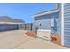 Side yard with generator, AC unit, privacy fence, and concrete slab at 175 Darby Meadow Ln, Ridgeville, SC 29472