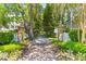 Brick-paved entrance with charming brick pillars and mature trees, welcoming you into a beautiful neighborhood at 1828 S James Gregarie Rd, Mount Pleasant, SC 29466