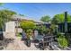 Secluded backyard featuring an outdoor seating area surrounded by manicured landscaping at 1852 Pierce St, Charleston, SC 29492