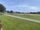 Beautiful community baseball field with well-maintained grass and clear blue skies at 1852 Pierce St, Charleston, SC 29492