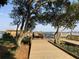Beautiful boardwalk overlooking the water with benches and lush green landscaping at 1852 Pierce St, Charleston, SC 29492