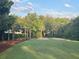 A lovely common area features bocce ball courts, picnic tables and mature landscaping at 1852 Pierce St, Charleston, SC 29492
