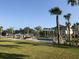 A great community green space with walking paths, landscaping and a beautiful building in the background at 1852 Pierce St, Charleston, SC 29492
