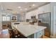 Modern kitchen featuring a large island with seating, stainless steel appliances, and hardwood floors at 1852 Pierce St, Charleston, SC 29492