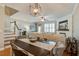 Open-concept living room features a dining area, fireplace, and hardwood floors at 1852 Pierce St, Charleston, SC 29492