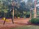 Community playground with swings and play equipment for children to enjoy outdoor activities at 1852 Pierce St, Charleston, SC 29492