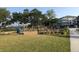 A wonderful community playground surrounded by lush green landscaping at 1852 Pierce St, Charleston, SC 29492