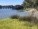 Charming waterfront community with wooden boardwalks, tranquil water views, and lush green landscaping at 1852 Pierce St, Charleston, SC 29492