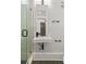 Modern bathroom with a glass shower and sleek, wall-mounted sink at 19 Smith St # A, Charleston, SC 29401