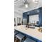 View of kitchen island, stainless steel appliances, unique lighting, and elegant design at 19 Smith St # A, Charleston, SC 29401