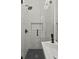 Close-up of a shower with glass enclosure and rain shower head at 19 Smith St # A, Charleston, SC 29401