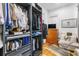 Organized walk-in closet features custom shelving and ample storage in a naturally lit space at 19 Smith St # A, Charleston, SC 29401