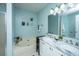 Charming bathroom with a soaking tub, double vanity, and stylish fixtures at 1918 Piper Dr, Charleston, SC 29407