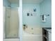 Inviting bathroom with a separate shower and a soaking tub, providing a spa-like experience at 1918 Piper Dr, Charleston, SC 29407