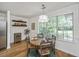 Eat-in kitchen area filled with natural light, complimented by wood flooring and stylish decor at 1918 Piper Dr, Charleston, SC 29407