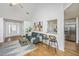 Bright, open floor plan with a living room with hardwood floors and a view of the kitchen and dining area at 1918 Piper Dr, Charleston, SC 29407