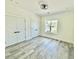 Spacious bedroom featuring two closets, a window, and wood-look flooring at 1991 Joppa Ave, North Charleston, SC 29405