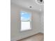 A bright bedroom is showcasing a framed window with a lovely view and natural light at 1991 Joppa Ave, North Charleston, SC 29405