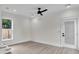Living room features modern flooring, neutral colored walls, recessed lighting, and a ceiling fan at 1991 Joppa Ave, North Charleston, SC 29405