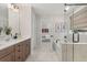 Bright bathroom with double vanity, glass shower, and tub, offering a spa-like experience at 200 Bear Oak Ct, Moncks Corner, SC 29461
