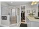 Bathroom boasting glass shower and granite counters and access to the walk-in closet at 203 Oak View Way, Summerville, SC 29483