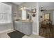 Bathroom with dual sink vanity, granite counters, and a window allowing natural light at 203 Oak View Way, Summerville, SC 29483