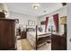 Comfortable bedroom with wood furniture, natural light, and serene atmosphere at 207 Allen Richard Ct # B, Moncks Corner, SC 29461