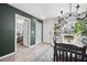 Bright dining room with hardwood floors, chandelier, and ample natural light at 207 Allen Richard Ct # B, Moncks Corner, SC 29461