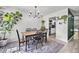 Bright dining room with hardwood floors and view of the kitchen at 207 Allen Richard Ct # B, Moncks Corner, SC 29461