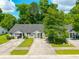 Aerial view of a well-maintained home surrounded by mature trees at 207 Allen Richard Ct # B, Moncks Corner, SC 29461