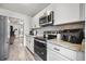 Bright, updated kitchen featuring stainless steel appliances and pristine countertops at 207 Allen Richard Ct # B, Moncks Corner, SC 29461
