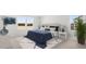 Well-lit bedroom with a queen-size bed, neutral walls, and decorative pillows at 218 Yalton St, Summerville, SC 29486