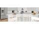 Spacious open kitchen with stainless appliances, a large island, and seating for four at 218 Yalton St, Summerville, SC 29486