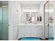 Bathroom features double vanity sinks with modern fixtures and a large, decorative mirror at 2233 Glendale Dr, Charleston, SC 29414