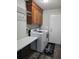 Functional laundry room equipped with a washer, dryer, and cabinetry for storage at 2233 Glendale Dr, Charleston, SC 29414