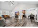 Open-concept living room with vaulted ceilings that connects the kitchen and dining area at 2233 Glendale Dr, Charleston, SC 29414