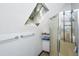 Bathroom featuring a walk-in shower with glass doors and a skylight at 2468 Marina Rd, Wadmalaw Island, SC 29487