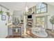 Open kitchen layout with stainless steel appliances, butcher block countertops, and easy access to the living and dining areas at 2468 Marina Rd, Wadmalaw Island, SC 29487