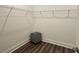 Walk-in closet with wire shelving and a decorative stool for added convenience at 260 Huguenot Trl, Huger, SC 29450