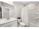 Bright bathroom featuring a bathtub and shower combination and a single sink vanity at 2747 Calico Bass Ln, Johns Island, SC 29455