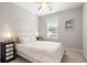 Cozy bedroom with a comfortable bed, two nightstands, and a ceiling fan at 2747 Calico Bass Ln, Johns Island, SC 29455