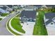 An aerial view showcases the home's curb appeal and meticulously maintained front yard at 277 Fiddleback Dr, Summerville, SC 29486