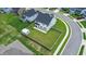 Aerial view of a spacious backyard with privacy fence, shed, patio, and surrounding neighborhood at 277 Fiddleback Dr, Summerville, SC 29486