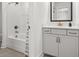 Bright bathroom featuring a shower and tub combination with a single sink vanity and tile flooring at 277 Fiddleback Dr, Summerville, SC 29486