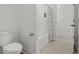 Bright bathroom with a toilet, tub with shower, and neutral finishes at 277 Fiddleback Dr, Summerville, SC 29486