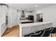 Bright, open kitchen featuring stainless steel appliances, white cabinetry, and a center island at 277 Fiddleback Dr, Summerville, SC 29486