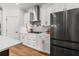 Well-appointed kitchen featuring white cabinetry, stainless steel appliances, and a gas range at 277 Fiddleback Dr, Summerville, SC 29486